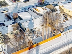Snowy aerial view featuring a residential view - 