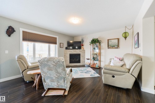 4914 47 Street, Redwater, AB - Indoor Photo Showing Living Room With Fireplace