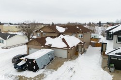 Snowy aerial view with a residential view - 
