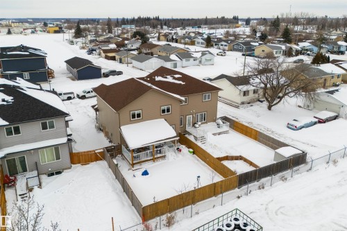 Snowy aerial view with a residential view - 4914 47 Street, Redwater, AB - Outdoor