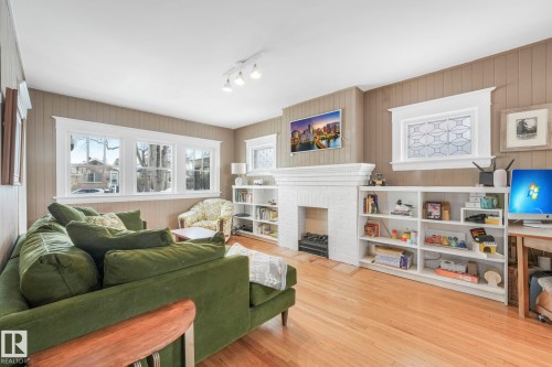 11036 125 Street, Edmonton, AB - Indoor Photo Showing Living Room With Fireplace