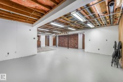 Finished below grade area with brick wall - 