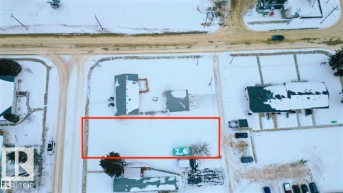 Aerial view of property and surrounding area featuring property parcel outlined - 5009 53 Avenue, Wabamun, AB 