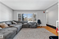 Living area featuring light wood finished floors and baseboards - 