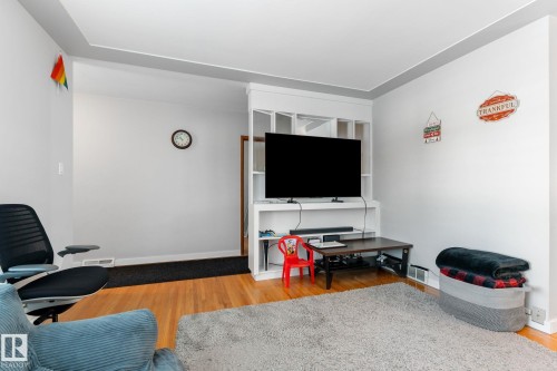 Living area with light wood-style flooring - 9847 79 Street, Edmonton, AB - Indoor