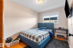 Bedroom featuring wood finished floors - 