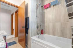 Full bath featuring shower / bathtub combination and vanity - 