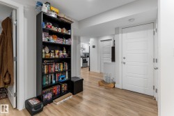 Sitting room featuring light wood-style flooring - 