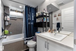 Bathroom with vanity and tiled shower / bath - 