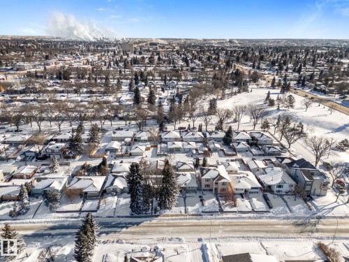 Snowy aerial view featuring a residential view - 9847 79 Street, Edmonton, AB - Outdoor With View