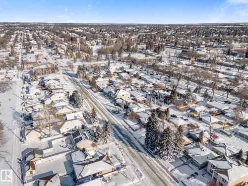 Snowy aerial view featuring a residential view - 9847 79 Street, Edmonton, AB - Outdoor With View