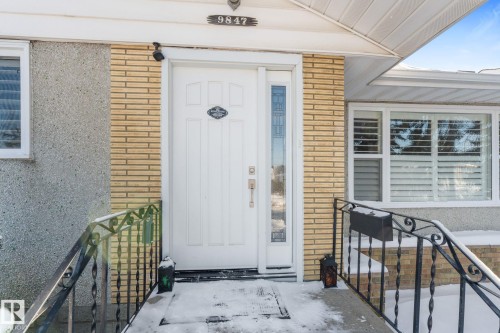 Doorway to property with brick siding - 9847 79 Street, Edmonton, AB - Outdoor With Exterior