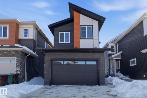 Contemporary house with a garage and brick siding - 90 Eldridge Point(E), St. Albert, AB - Outdoor