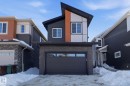 Contemporary house with a garage and brick siding - 90 Eldridge Point(E), St. Albert, AB  - Outdoor 