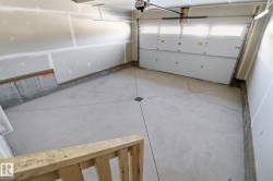 Garage featuring a garage door opener - 