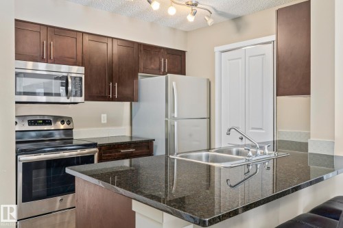 109 5370 Chappelle Road, Edmonton, AB - Indoor Photo Showing Kitchen With Stainless Steel Kitchen With Double Sink