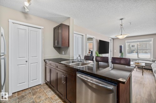 109 5370 Chappelle Road, Edmonton, AB - Indoor Photo Showing Kitchen With Double Sink