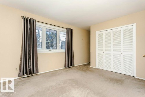 Unfurnished bedroom featuring carpet floors and a closet - 6304 131 Street, Edmonton, AB - Indoor Photo Showing Other Room