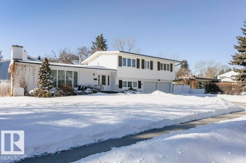 View of front of property featuring a garage - 6304 131 Street, Edmonton, AB - Outdoor