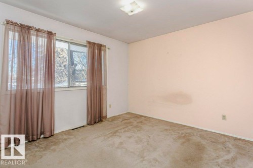 Unfurnished room with carpet flooring - 6304 131 Street, Edmonton, AB - Indoor Photo Showing Other Room