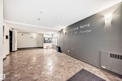 Spare room featuring light tile patterned floors, heating unit, a textured wall, and recessed lighting - 