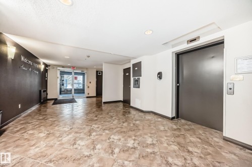 View of common area - 306 1188 Hyndman Road, Edmonton, AB - Indoor Photo Showing Other Room