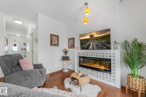 3 450 Mcconachie Way, Edmonton, AB - Indoor Photo Showing Living Room With Fireplace