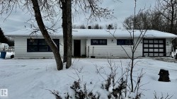 View of front of home featuring a garage - 
