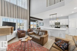 View from the great room into the kitchen and kitchen nook. - 