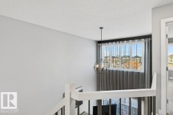 Detailed view of a textured ceiling and a chandelier - 