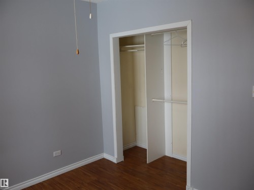 View of closet - 5109 55 Street, Barrhead, AB - Indoor Photo Showing Other Room