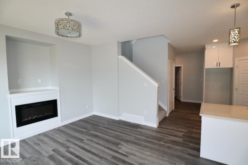 4918 47 Street, Gibbons, AB - Indoor With Fireplace