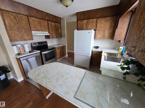 5213 46 Avenue, Drayton Valley, AB - Indoor Photo Showing Kitchen With Double Sink