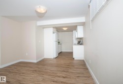Interior space with light wood-style floors and baseboards - 