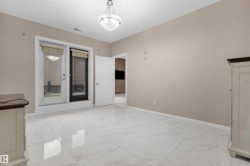 105 160 Magrath Road, Edmonton, AB - Indoor Photo Showing Other Room