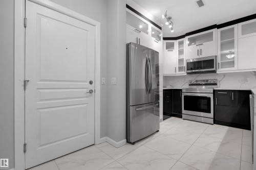 105 160 Magrath Road, Edmonton, AB - Indoor Photo Showing Kitchen With Stainless Steel Kitchen