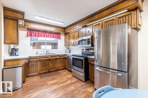 23 Allen Place, Leduc, AB - Indoor Photo Showing Kitchen With Double Sink