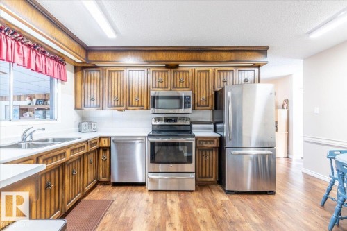 23 Allen Place, Leduc, AB - Indoor Photo Showing Kitchen With Double Sink
