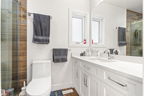 Full bath with a stall shower and vanity - 14412 80 Avenue Nw, Edmonton, AB - Indoor Photo Showing Bathroom