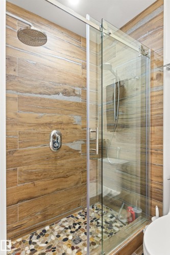 Full bath with a stall shower and toilet - 14412 80 Avenue Nw, Edmonton, AB - Indoor Photo Showing Bathroom