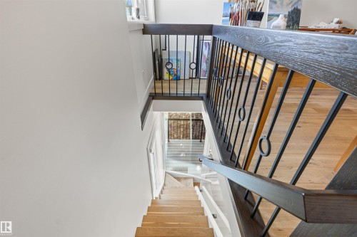 Stairs featuring wood finished floors - 14412 80 Avenue Nw, Edmonton, AB - Indoor Photo Showing Other Room