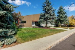 View of front facade with a front lawn - 