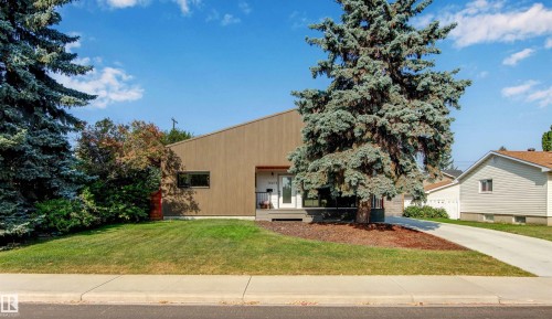 View of front of property featuring a front yard and a porch - 14412 80 Avenue Nw, Edmonton, AB - Outdoor
