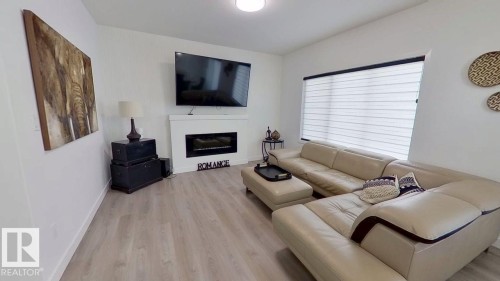 1758 Erker Way, Edmonton, AB - Indoor Photo Showing Living Room With Fireplace