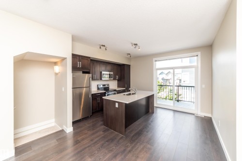 22 2560 Pegasus Boulevard, Edmonton, AB - Indoor Photo Showing Kitchen With Stainless Steel Kitchen