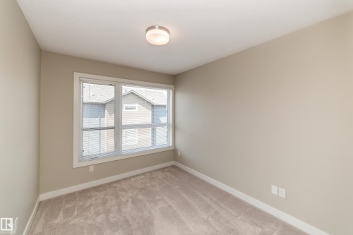 22 2560 Pegasus Boulevard, Edmonton, AB - Indoor Photo Showing Other Room