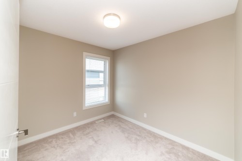 22 2560 Pegasus Boulevard, Edmonton, AB - Indoor Photo Showing Other Room