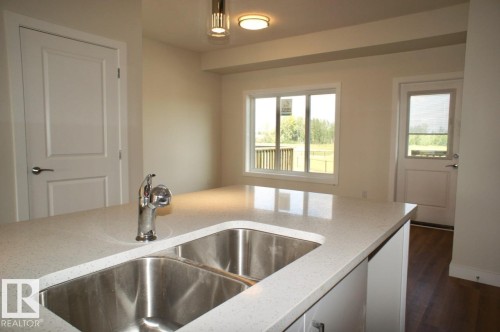 4508 50 Avenue, Redwater, AB - Indoor Photo Showing Kitchen With Double Sink