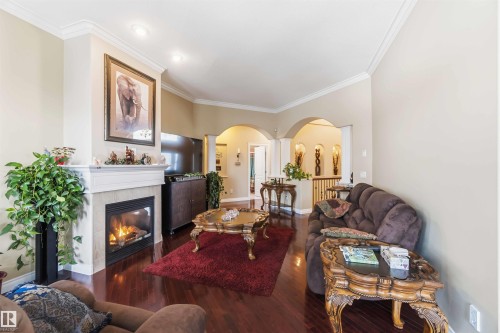 40 Landing Trails Drive, Gibbons, AB - Indoor Photo Showing Living Room With Fireplace
