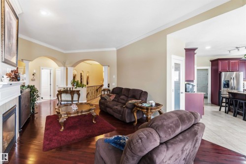 40 Landing Trails Drive, Gibbons, AB - Indoor Photo Showing Living Room With Fireplace